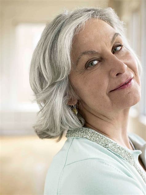 This grey textured pixie hairstyle is perfect for women over 70. Notice how the layers create movement even in this short haircut. That looks striking for a mature woman! It only takes 10 minutes to style. Uses foam to style, sectioning your hair and using a round brush. A little hairspray, and you’re good to go!